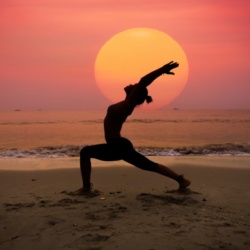 woman-practicing-yoga-with-sun-her_1286-172